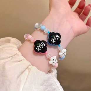 Ins-style four-leaf clover LED bracelet watch with cartoon smiley face beads, electronic watch for girls and students, small gift wholesale